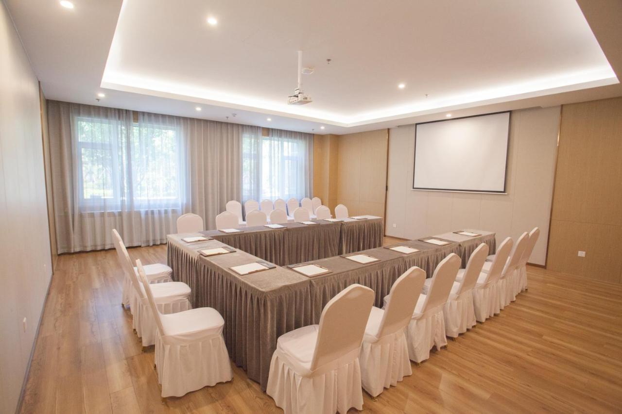 Joy Fall Hotel Jiaozhou Esterno foto