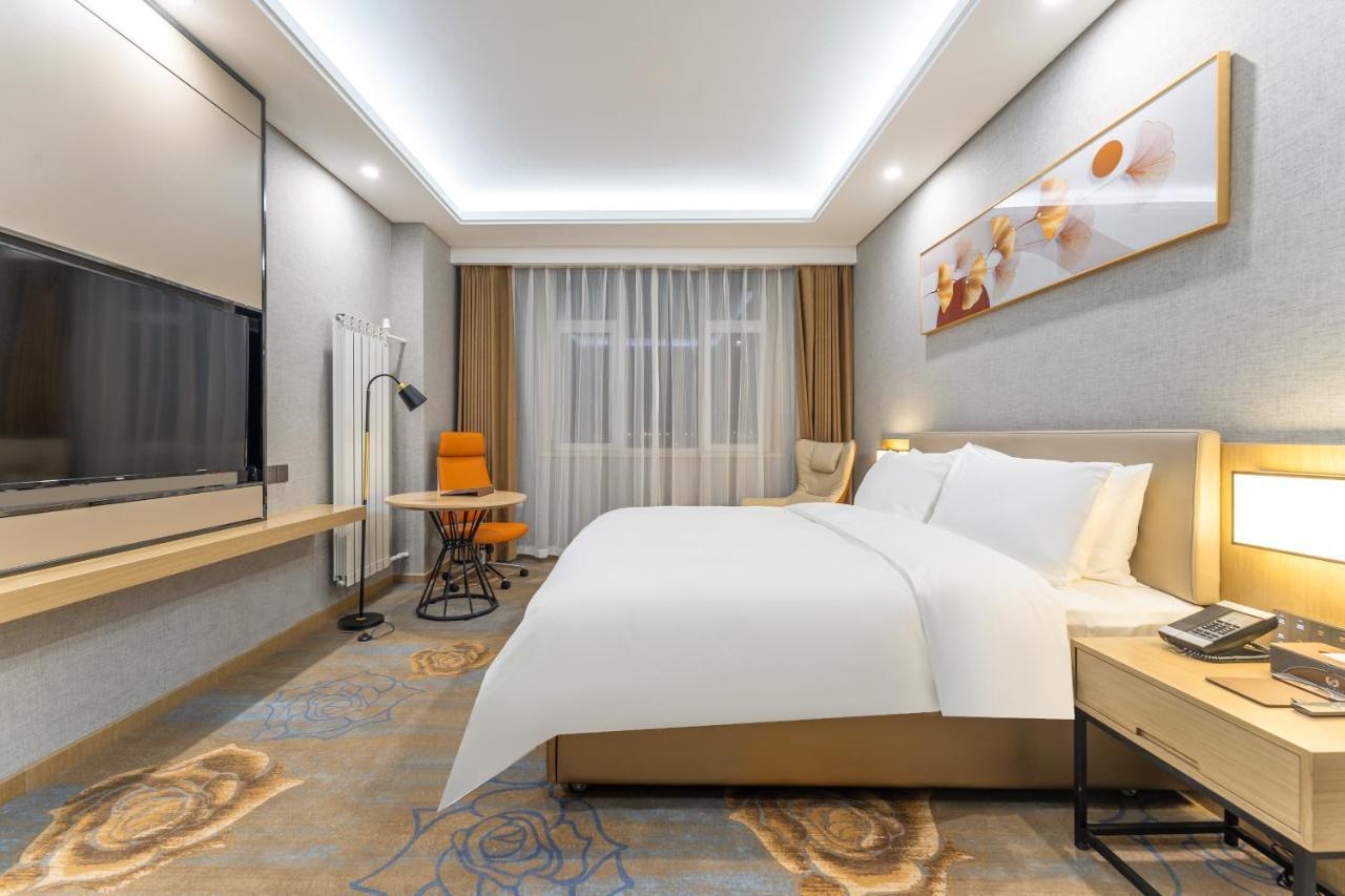 Joy Fall Hotel Jiaozhou Esterno foto